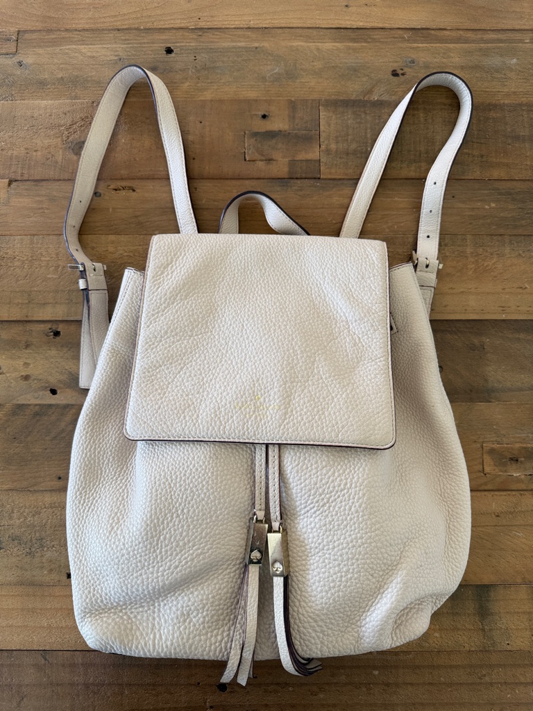 Kate Spade Pebble Leather Drawstring Backpack In Light Cream